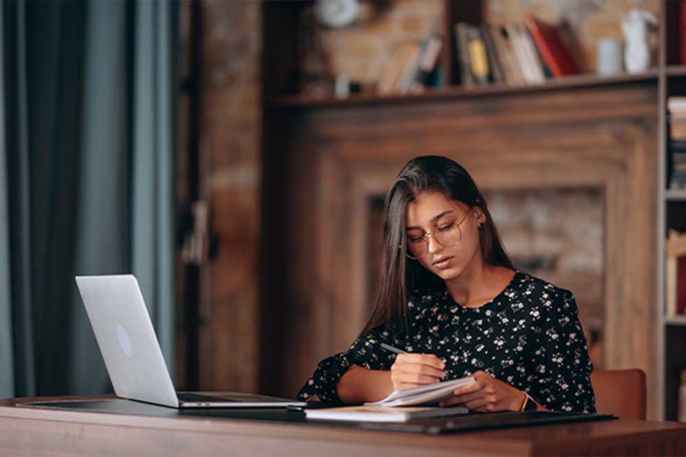 Lady studying in library